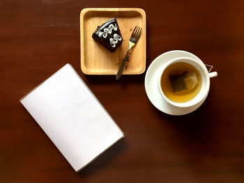 High angle view of coffee cup on table