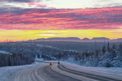 Scenic view of dramatic landscape during sunset