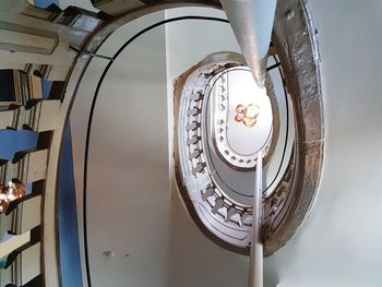 Directly below shot of spiral staircase in building