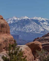 Fantastic scenic red sandstone rock formations in stunning mountainous terrain