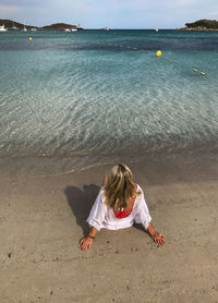 Rear view of woman on beach