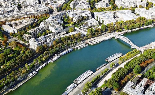 High angle view of river amidst buildings in city