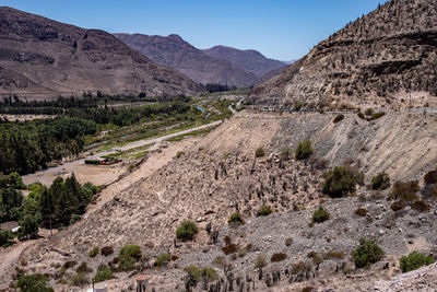 Scenic view of desert against clear sky