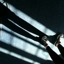 High angle view of shadow on floor