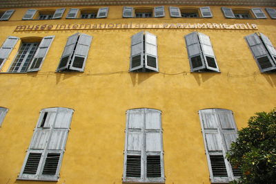 Low angle view of yellow building
