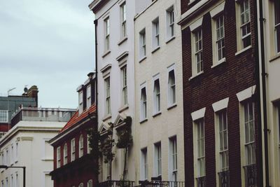 Low angle view of residential buildings against sky