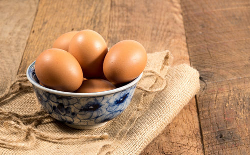 High angle view of eggs in bowl on table