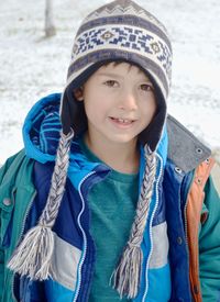 Portrait of smiling boy wearing knit hat