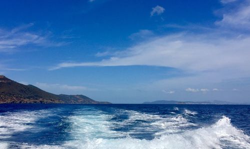 Scenic view of sea against blue sky