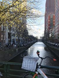 Canal amidst buildings in city