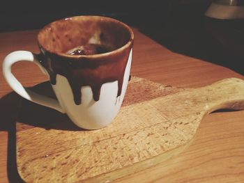 Close-up of coffee cup on table