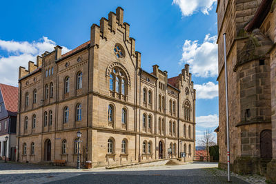 Low angle view of historic building against sky