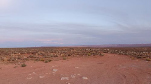 Scenic view of desert against sky