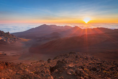 Scenic view of mountains during sunset