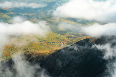Aerial view of rainbow over land