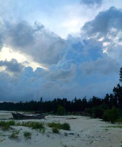 Scenic view of sea against cloudy sky