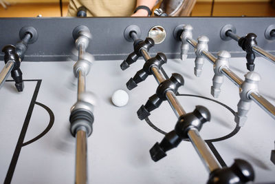 A close-up of a football table. details of a football table, a game for a rest and children