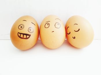 Close-up of easter eggs against white background