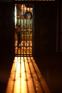 Close-up of illuminated lamp at night