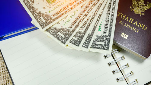 High angle view of paper currency on table