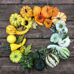 High angle view of various flowers on wooden table