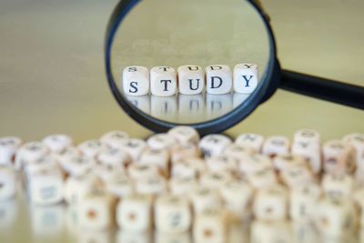 Close-up of text on glass