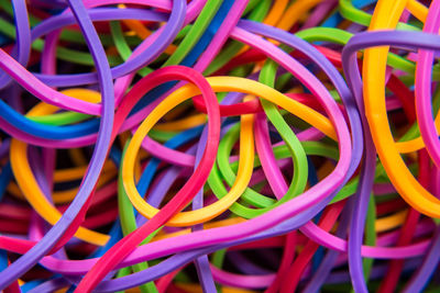 Close-up of multi colored rubber bands