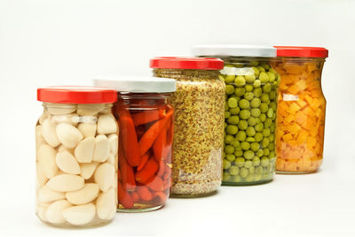 Close-up of candies against white background