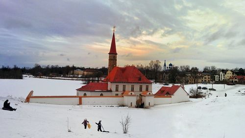 View of temple against sky during winter