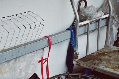 High angle view of old boat hanging on wall