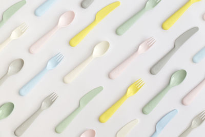 Food plastic cutlery on white background. concept of recycling plastic and ecology.