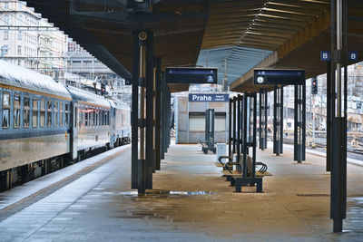 Empty railroad station platform in city