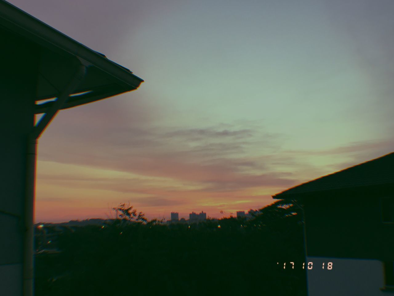 LOW ANGLE VIEW OF SILHOUETTE TREES AGAINST SKY AT SUNSET