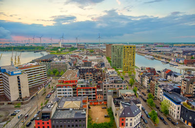 High angle view of buildings in city against sky