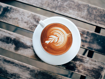 High angle view of cappuccino on table