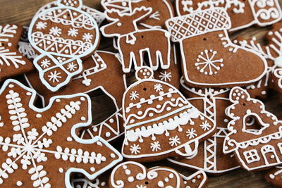 Close-up of christmas gingerbread cookies on wooden surface