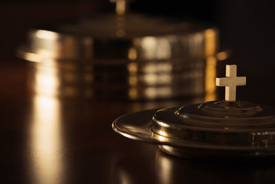 Close-up of tea light on table