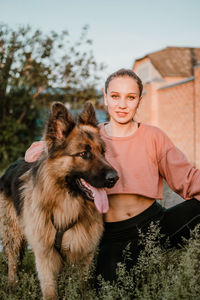 Portrait of girl with dog