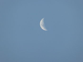 Low angle view of moon in sky