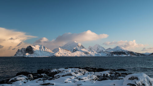 Scenic view of sea against sky during winter