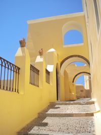 Alley by building in santorini