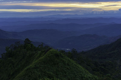 Scenic view of mountains against sky during sunset