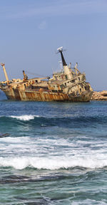 Ship in sea against sky