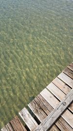 High angle view of pier on beach