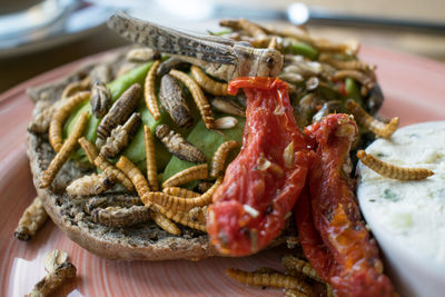 Close-up of serving food in plate