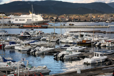 Boats moored at harbor