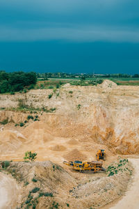 High angle view of mining industry against sky