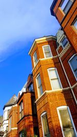 Low angle view of buildings against sky