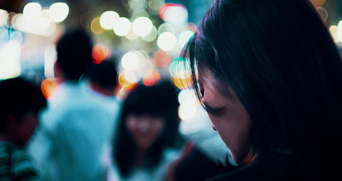 Close-up of woman looking at camera