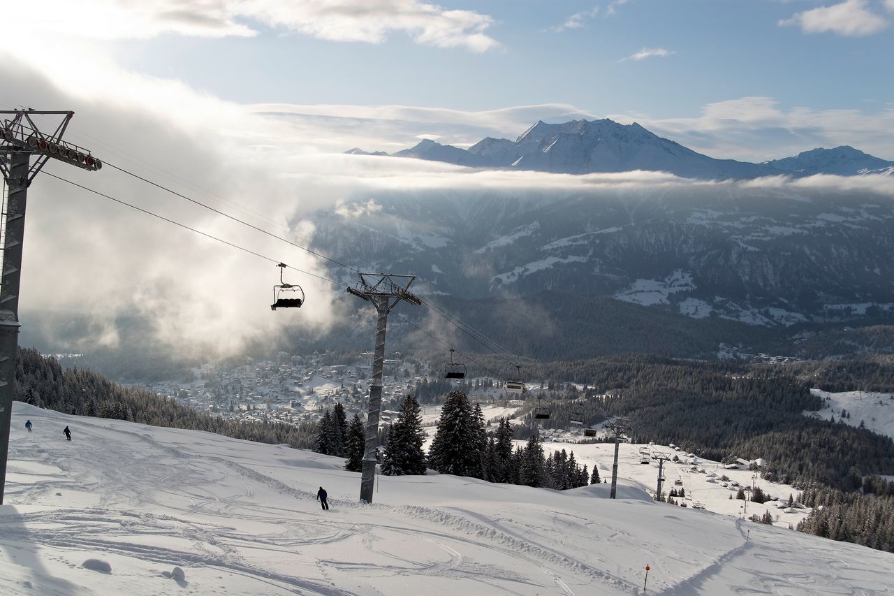 SCENIC VIEW OF SNOW COVERED MOUNTAINS